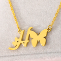 letter h necklace with butterfly pendant